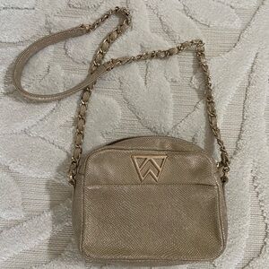 Kelly Wynn gold purse
